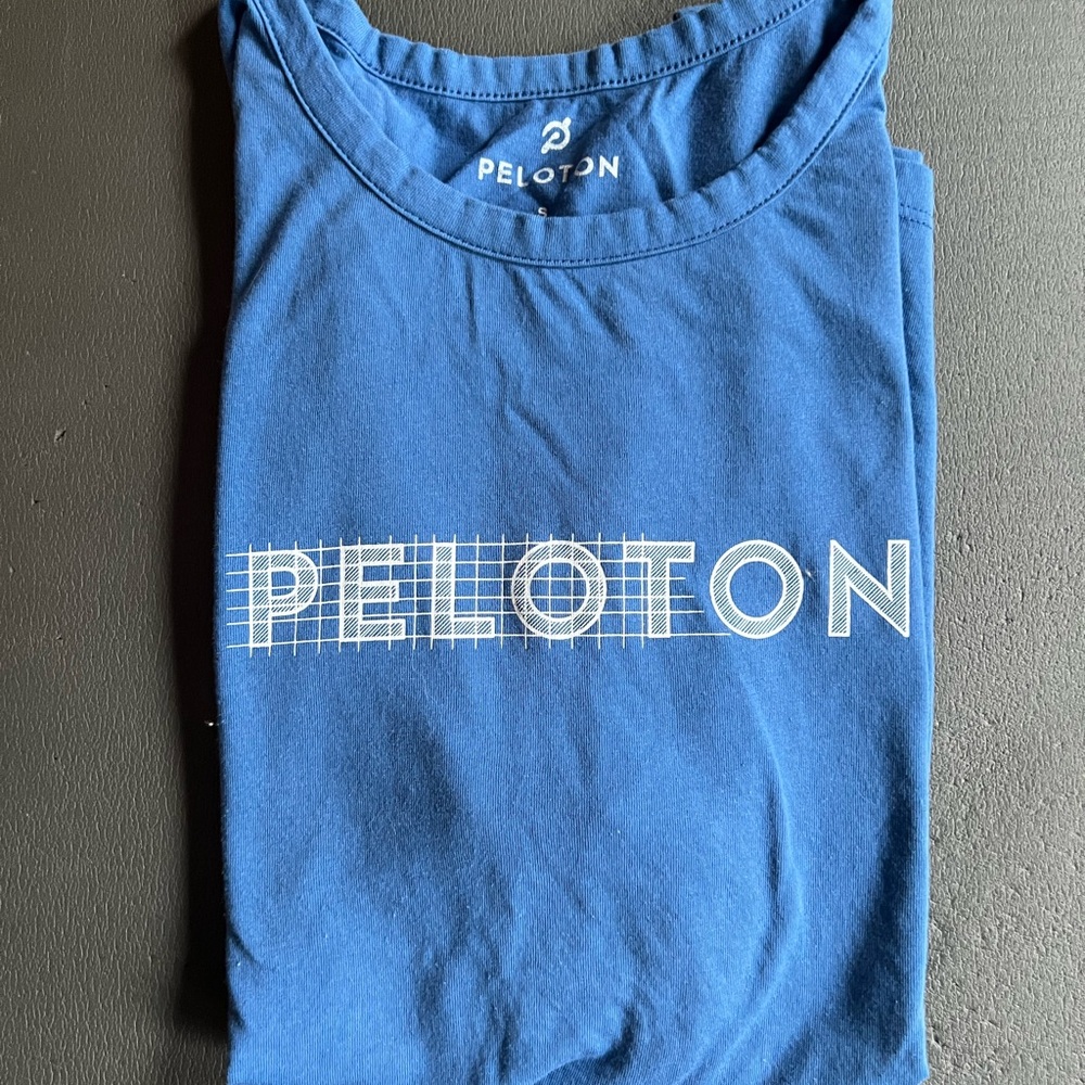 Peloton Blue Women’s Tank. Small, fits more like a Medium.